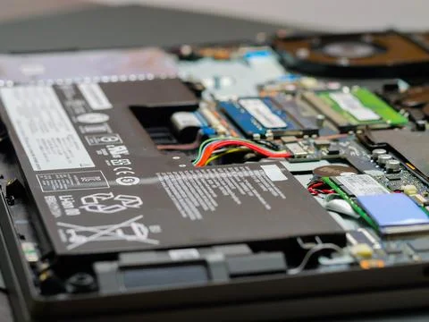 Laptop battery plug, inside of gaming laptop Stock Photos