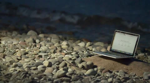 Laptop on the beach Stock Footage 67462366