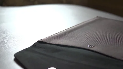 Laptop Being Put into Case 動画素材 83525277