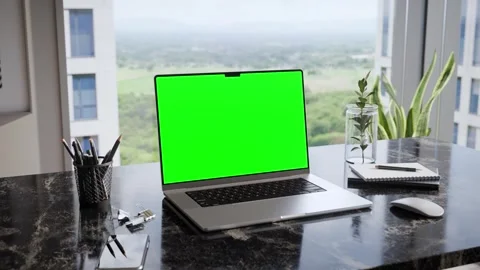 Laptop blank green screen mockup in a modern executive office interior and na Stock Footage 337987159