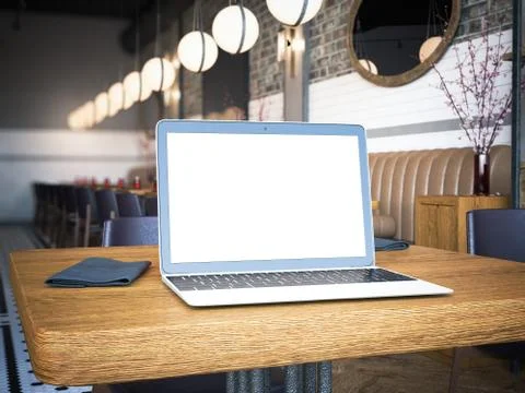 Laptop with blank screen on the cafe table. 3d rendering Illustrazione stock