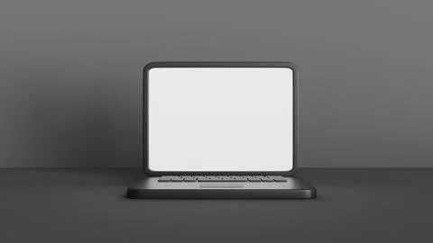 A laptop with a blank screen on a gray background for website mockups, onli.. Stock Photos