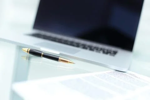 Laptop with blank screen on table. Stock Photos