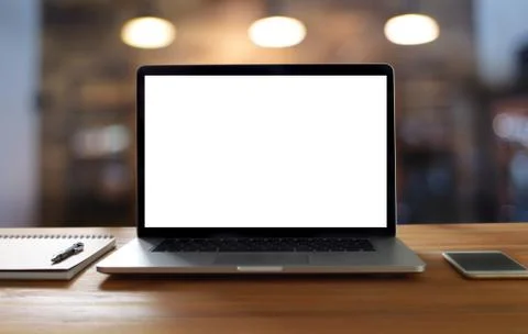 Laptop with blank screen on table. Workspace background new project on laptop 写真素材