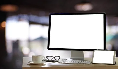 Laptop with blank screen on table. Workspace background new project on laptop Stock Photos