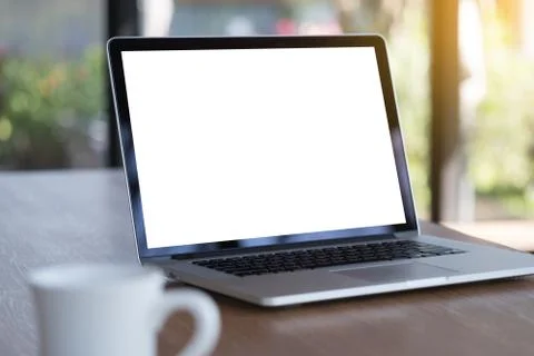 Laptop with blank screen on table. Workspace background new project on laptop Stock Photos