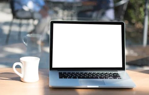 Laptop with blank screen on table. Workspace background new project on laptop Stock Photos