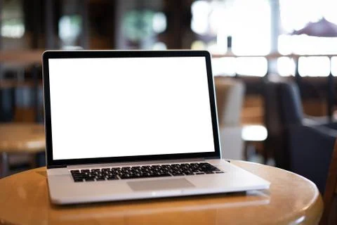 Laptop with blank screen on table. Workspace background new project on laptop Stock Photos