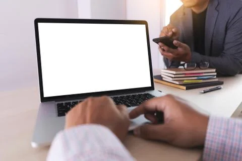 Laptop with blank screen on table. Workspace background new project on laptop Foto stock