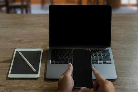 Laptop with blank screen on table. Workspace background new project on lapt.. Stock Photos