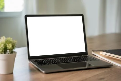 Laptop with blank screen on table. Workspace background new project on lapt.. Stock-Fotos