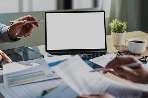 Laptop with blank screen on table. Workspace background new project on lapt.. Stock Photos