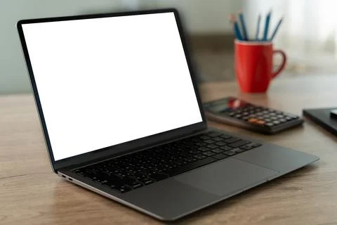 Laptop with blank screen on table. Workspace background new project on lapt.. Stock Photos