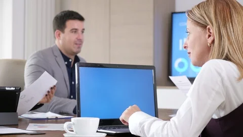 Laptop with a blue chroma screen Stock Footage 97589259