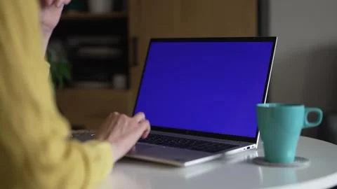 Laptop with blue screen chroma key mockup for content replacement. Stock Footage 340326160