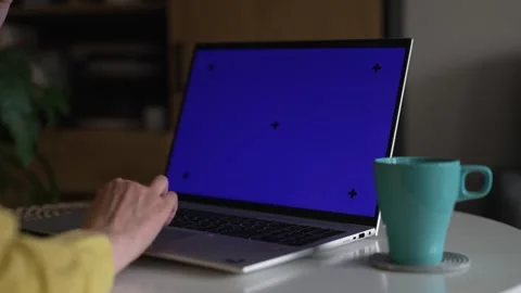 Laptop with blue screen chroma key mockup for content replacement. Stock Footage 340326169