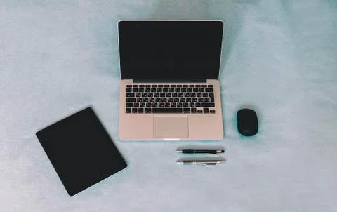 Laptop On Blue Table Foto stock