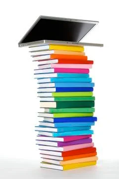 Laptop on book stack, side view Foto stock