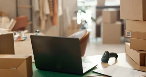 Laptop, boxes and empty warehouse for logistics, supply chain and scanner on Stock Footage 253472618