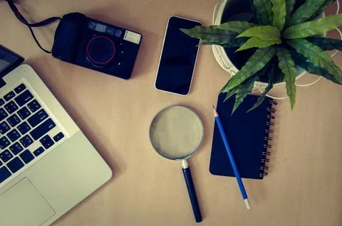 Laptop brown background Stock Photos