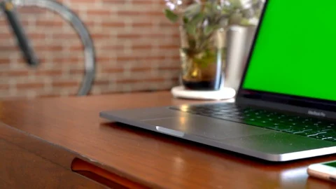 Laptop chroma key at home on the table Stock Footage 129679935