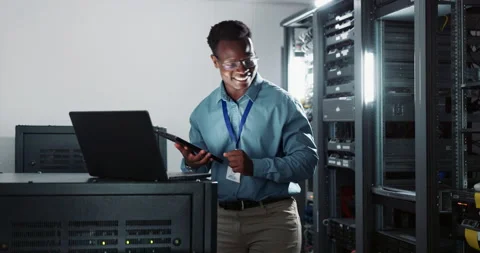 Laptop, coding and man engineer in server room for software, cybersecurity or Stock Footage 266565691