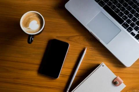 Laptop with coffee Stock Photos