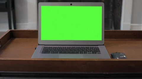 Laptop On Coffee Table Green Screen Straight On 2 Stock Footage 116627652