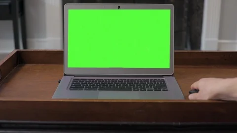 Laptop On Coffee Table Green Screen Straight On 1 Stock Footage 116627788