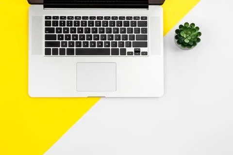 Laptop on color background, flat lay, workplace concept. Stock-Fotos