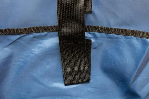 Laptop compartment inside blue backpack with fixing tape Stock Photos