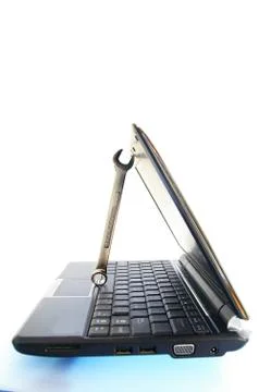 Laptop computer and a wrench ( pc repair ) Stock Photos