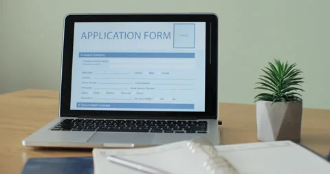 Laptop computer with an Application Form on its display. Stock Footage 233973592