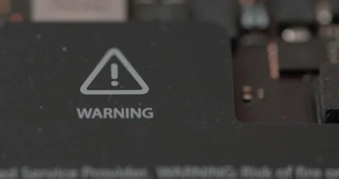 Laptop computer battery warning sign - 4K Prores 422 HQ Video stock 235567208