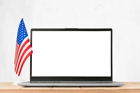 Laptop computer with blank screen and American flag isolated on white backgro Stock Photos
