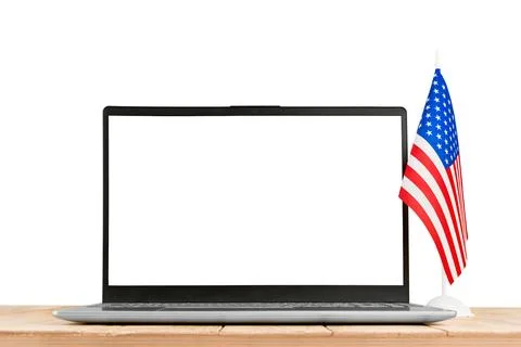 Laptop computer with blank screen and American flag isolated on white backgro Stock Photos