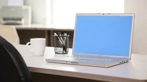 Laptop computer with blue screen in office Stock-Footage 61668054