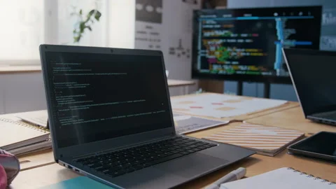 Laptop with Computer Code on Desk in Programming Class at School Stock Footage 306928685