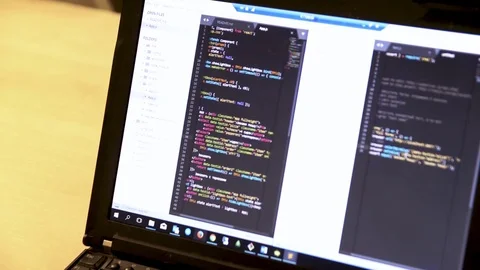 Laptop with computer code. Software development. Software source code Stock Footage 83043801
