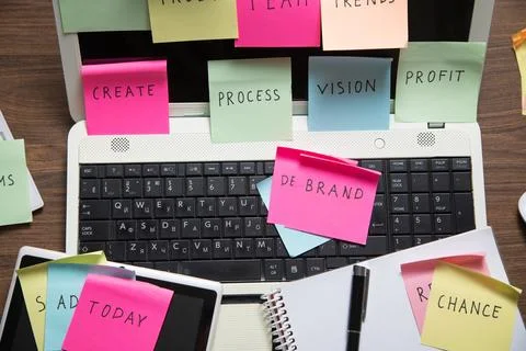 Laptop computer with colorful sticky notes. Business Foto stock