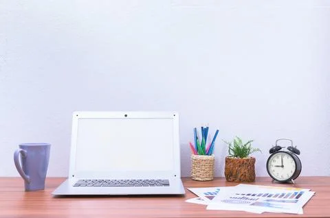 Laptop computer is at the desk Stock Photos