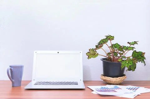 Laptop computer is at the desk Stock Photos