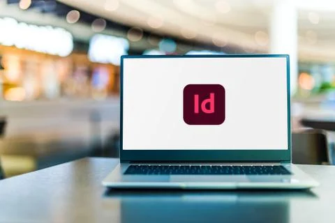 Laptop computer displaying logo of Adobe InDesign Foto stock