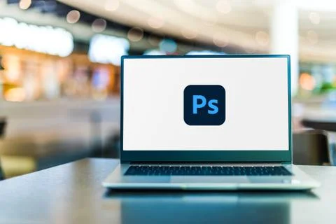 Laptop computer displaying logo of Adobe Photoshop 스톡 사진