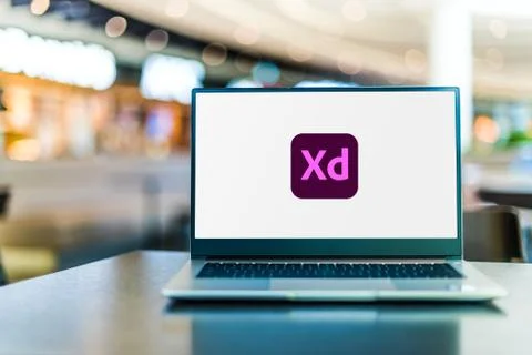 Laptop computer displaying logo of Adobe XD Stockfoto's
