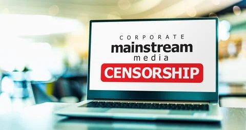 A laptop computer displaying the watchword: mainstream media censorship Stock Photos