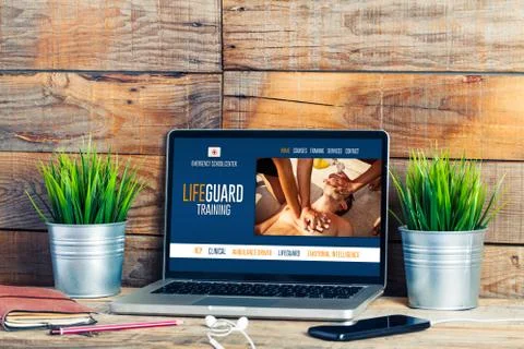 Laptop computer with Emergency services training courses in the screen Stock Photos