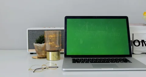 Laptop Computer Green Chroma Key Screen Stands on a Desk in the Living Room Stock Footage 127645674