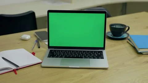 Laptop Computer with Green Screen Chroma Key On Desktop At Office Space Stock Footage 341865395