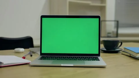 Laptop Computer with Green Screen Chroma Key On Desktop At Office Space Stock Footage 341865452